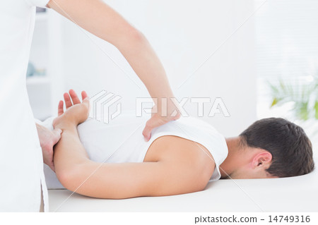 Man receiving back massage Man receiving back massage 14749316