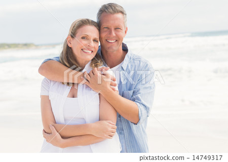 Happy couple smiling at camera Happy couple smiling at camera 14749317