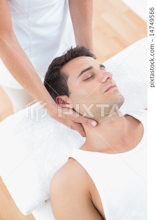 Man receiving neck massage Man receiving neck massage 14749566