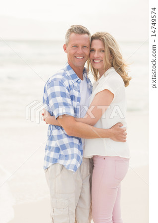 Casual couple smiling at camera Casual couple smiling at camera 14749574