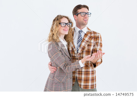 Happy geeky hipster couple holding their hands Happy geeky hipster couple holding their hands 14749575