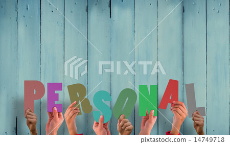 Composite image of hands holding up personal Composite image of hands holding up personal 14749718