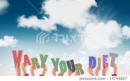 Composite image of hands holding up vary your diet Composite image of hands holding up vary your diet 14749867