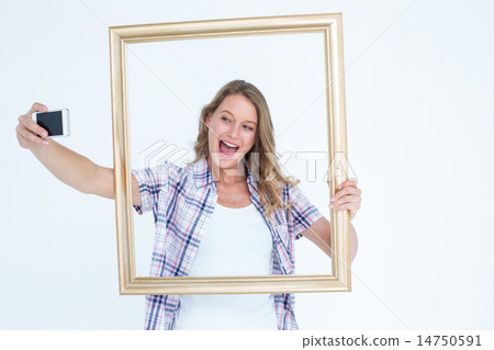 Pretty hipster taking selfie with smartphone 14750591