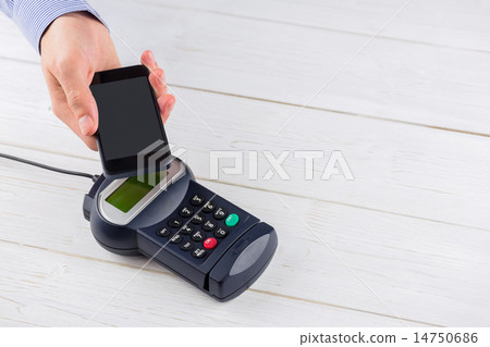Man using smartphone to express pay Man using smartphone to express pay 14750686