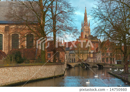 Lake Minnewater and church in Bruges, Belgium 14750980