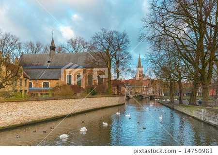 Lake Minnewater and church in Bruges, Belgium Lake Minnewater and church in Bruges, Belgium 14750981
