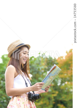 Young chinese traveller looking for direction 14753580