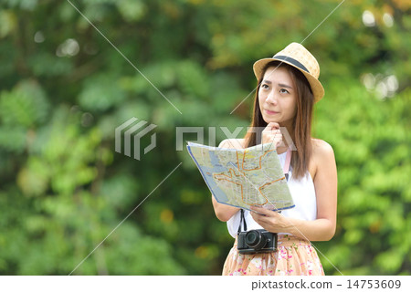 Young chinese traveller looking for direction 14753609