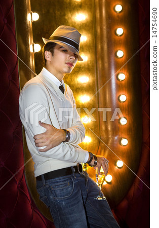 young man with glass of champagne young man with glass of champagne 14754690