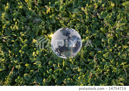 The earth enveloped in green 14754719