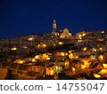 A night view of Matera's fantastically glowing stone cityscape (light, romantic, background material) 14755047
