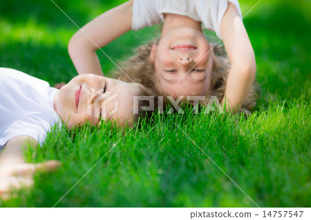 Happy children standing upside down Happy children standing upside down 14757547