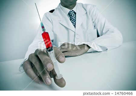sinister doctor with a syringe 14760466