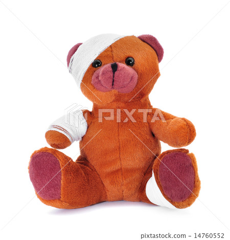 teddy bear with bandages in its head, arm and leg 14760552