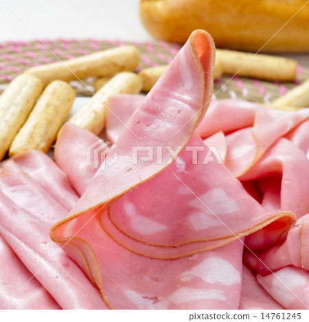 slices of mortadella and bread sticks 14761245