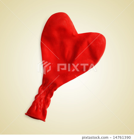 deflated heart-shaped balloon deflated heart-shaped balloon 14761390