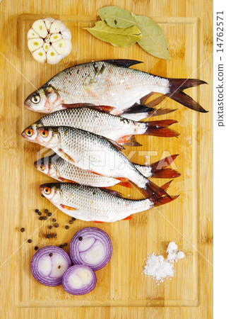 fresh water fish - bream with garlic and spices fresh water fish - bream with garlic and spices 14762571