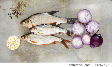 fresh water fish - bream with garlic and spices 14762572