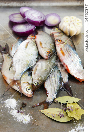 fresh water fish - bream with garlic and spices 14762577