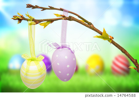 Composite image of hanging easter eggs 14764588