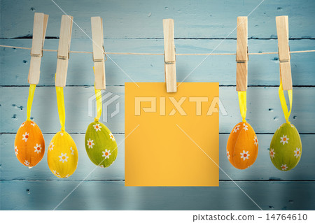 Composite image of hanging easter eggs Composite image of hanging easter eggs 14764610