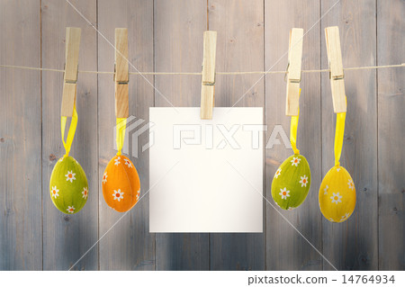 Composite image of hanging easter eggs 14764934