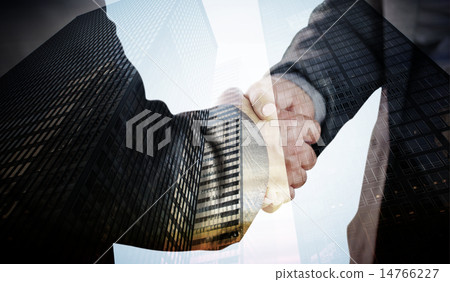 Composite image of business people shaking hands close up 14766227