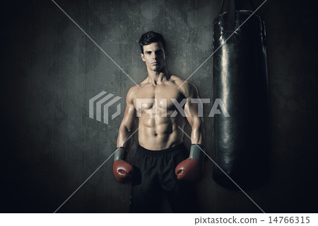 Composite image of muscular boxer 14766315