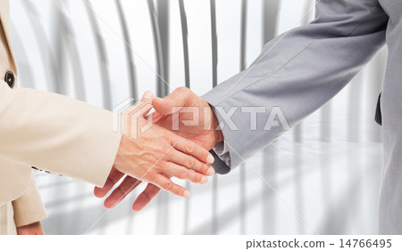 Composite image of close up of business people shaking their han 14766495