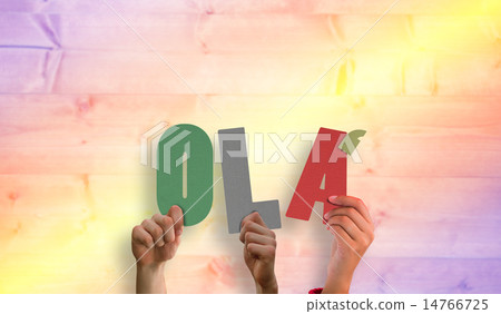 Composite image of hands holding up ola Composite image of hands holding up ola 14766725