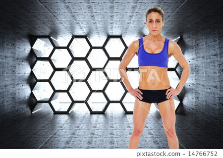Composite image of strong blonde posing with hands on hips looki 14766752
