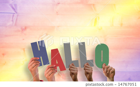 Composite image of hands holding up hallo 14767051