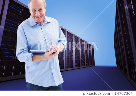 Composite image of happy mature man using his tablet pc Composite image of happy mature man using his tablet pc 14767364