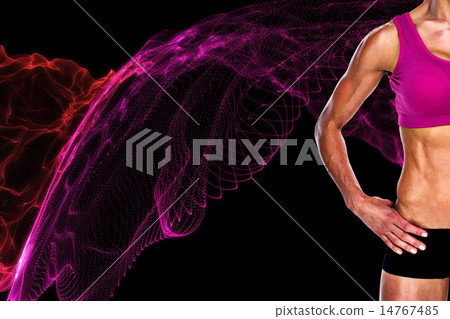 Composite image of female bodybuilder posing with hands on hips 14767485