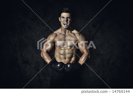 Composite image of muscular boxer 14768144