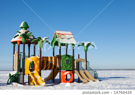 Children's playground in the snow 14768426