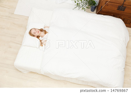Sleeping young white woman 14769867