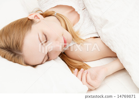 Sleeping young white woman Sleeping young white woman 14769871