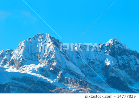 High mountains, covered by snow. High mountains, covered by snow. 14777829