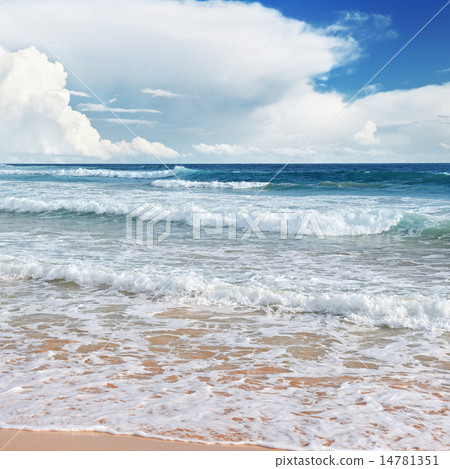 waves sea and yellow sand 14781351