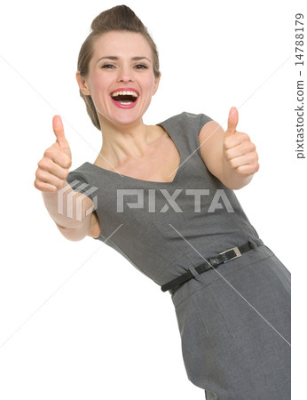 Happy woman showing thumbs up isolated 14788179