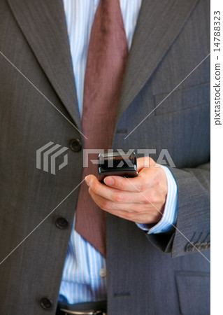 Mobile phone in man hand. Mobile communication. Close-up. 14788323