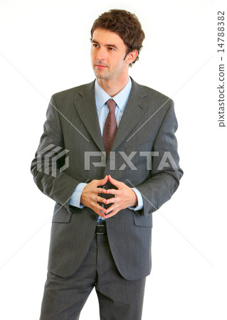 Thoughtful modern businessman looking in corner 14788382