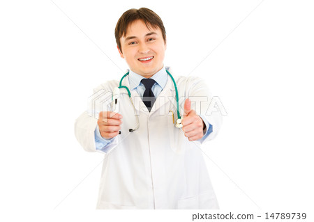 Smiling doctor holding medical thermometer and showing thumbs up gesture. 14789739