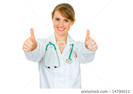 Smiling medical doctor woman showing thumbs up gesture. 14790022