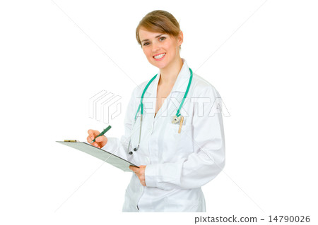 Smiling doctor woman making notes in medical chart. 14790026