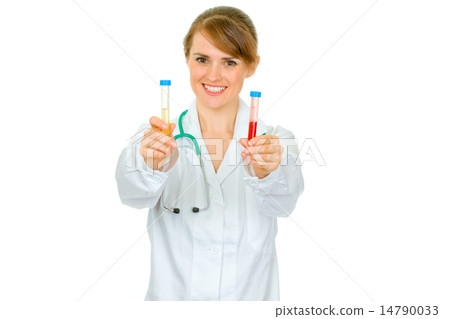 Smiling medical doctor woman holding test tubes in hand. 14790033
