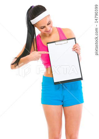 Slim girl pointing on blank clipboard 14790399