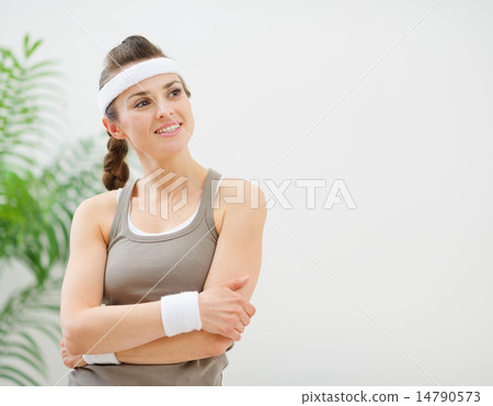 Portrait of fitness woman looking on copy space Portrait of fitness woman looking on copy space 14790573
